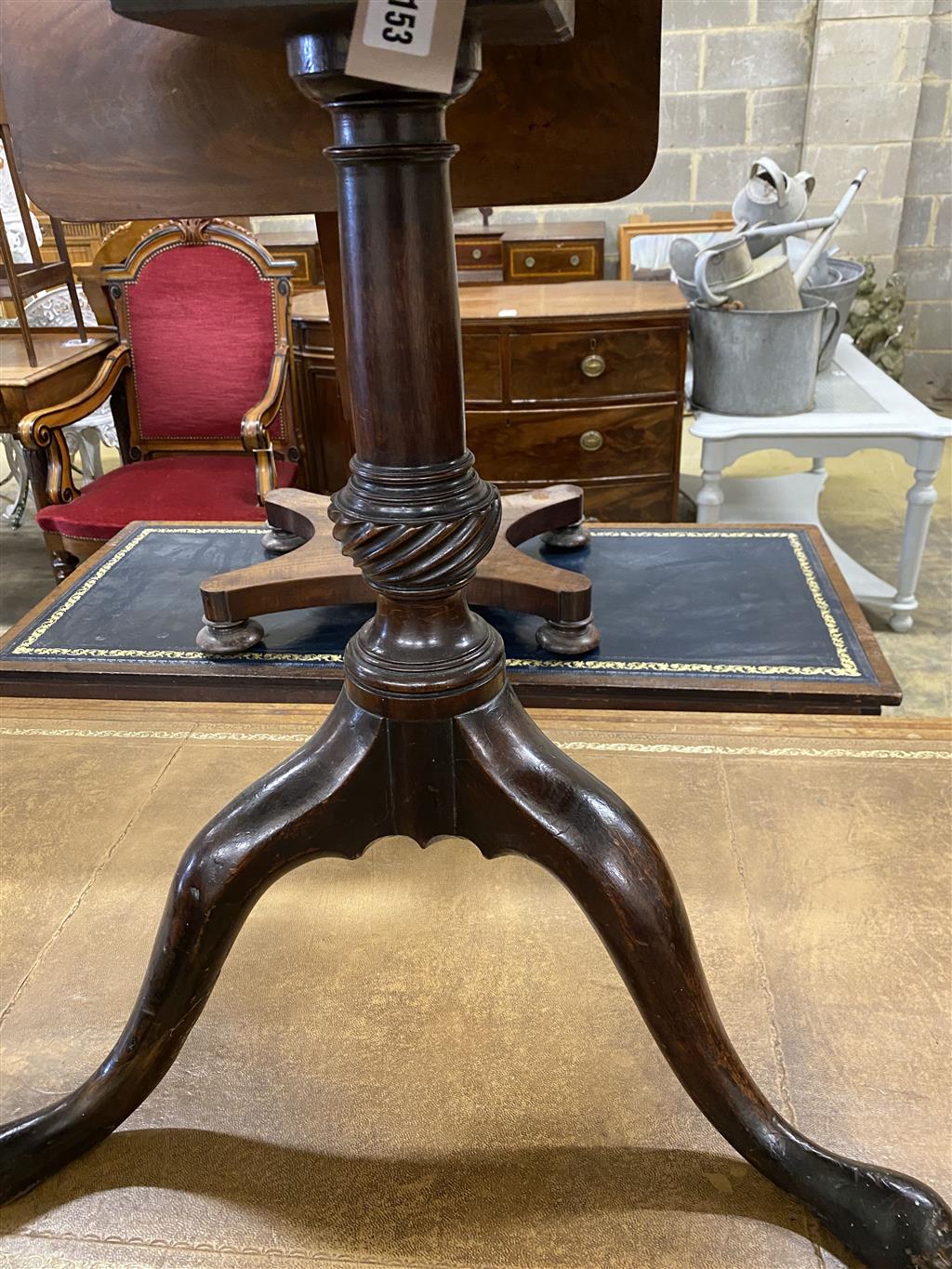 A George III mahogany circular tilt top birdcage tea table, 75cm diameter, height 70cm